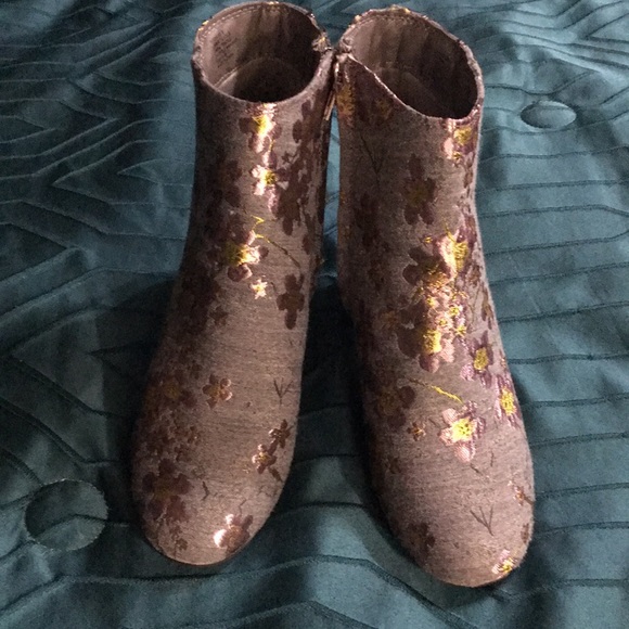 Cute little booties! That have embroidery on them. They fit into any style. - Picture 2 of 3